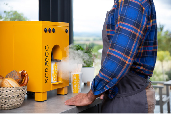 Scraegg machine cooks with steam